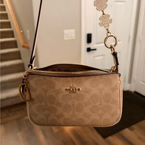Coach Beige Wristlet with Gold Accents